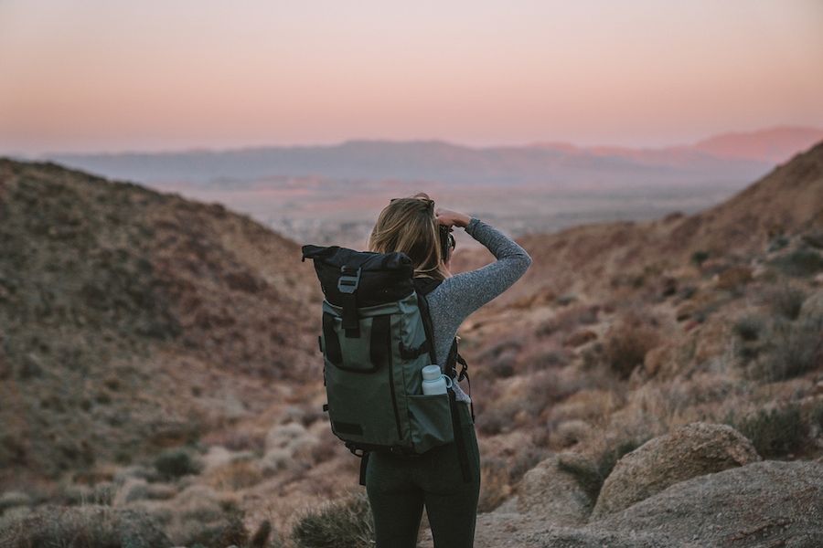 Michelle Halpern in joshua tree wearing the Wandrd PRVKE backpack