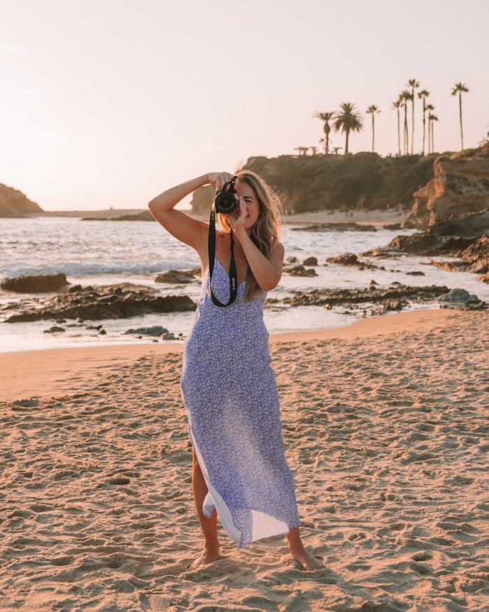 Packing List for International Travel Michelle Halpern in taking photos in Laguna Beach