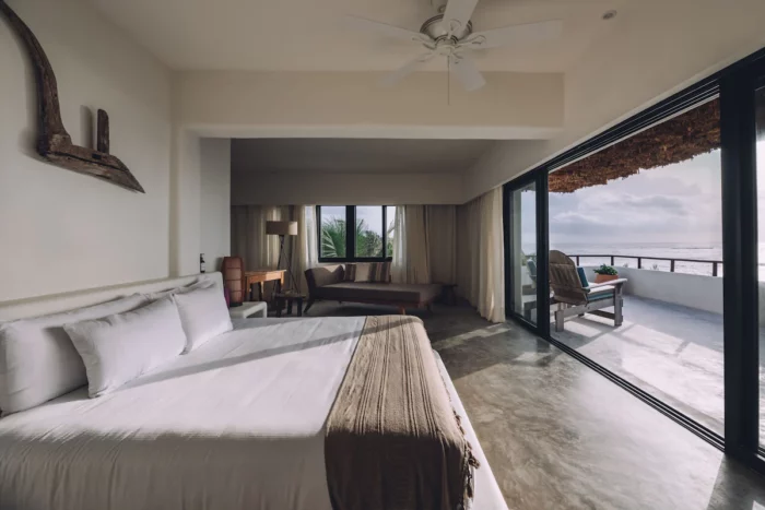 Guest room interior at Chiringuito Tulum overlooking the ocean - best Tulum beach hotel