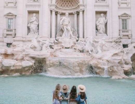 Girls trip in Rome, Italy standing in front of the Trevi Fountain