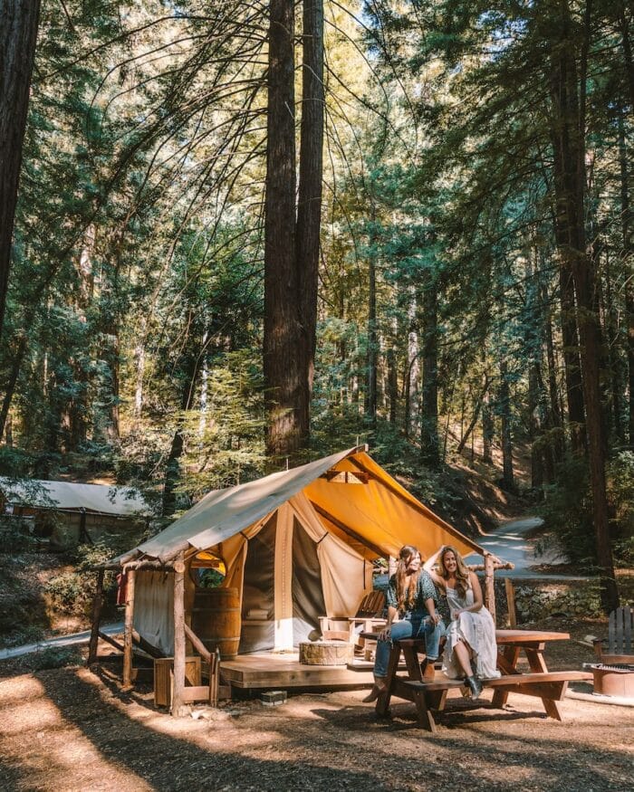 Girls sitting in front of safari tent at Alila Ventana glampsite