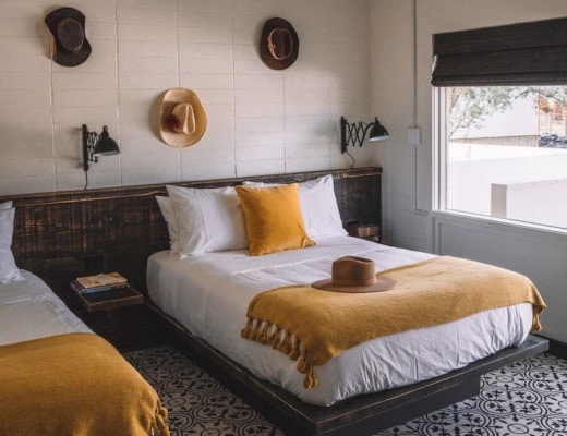 Interior of rooms at Cuyama Buckhorn with hats on the wall