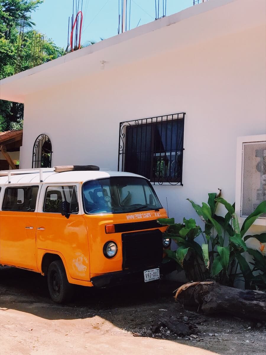 Orange vintage car for van life in Puerto Escondido