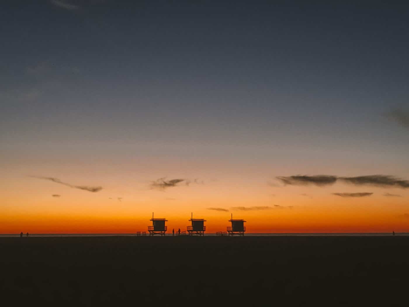 Sunset of lifeguard towers in Venice Beach