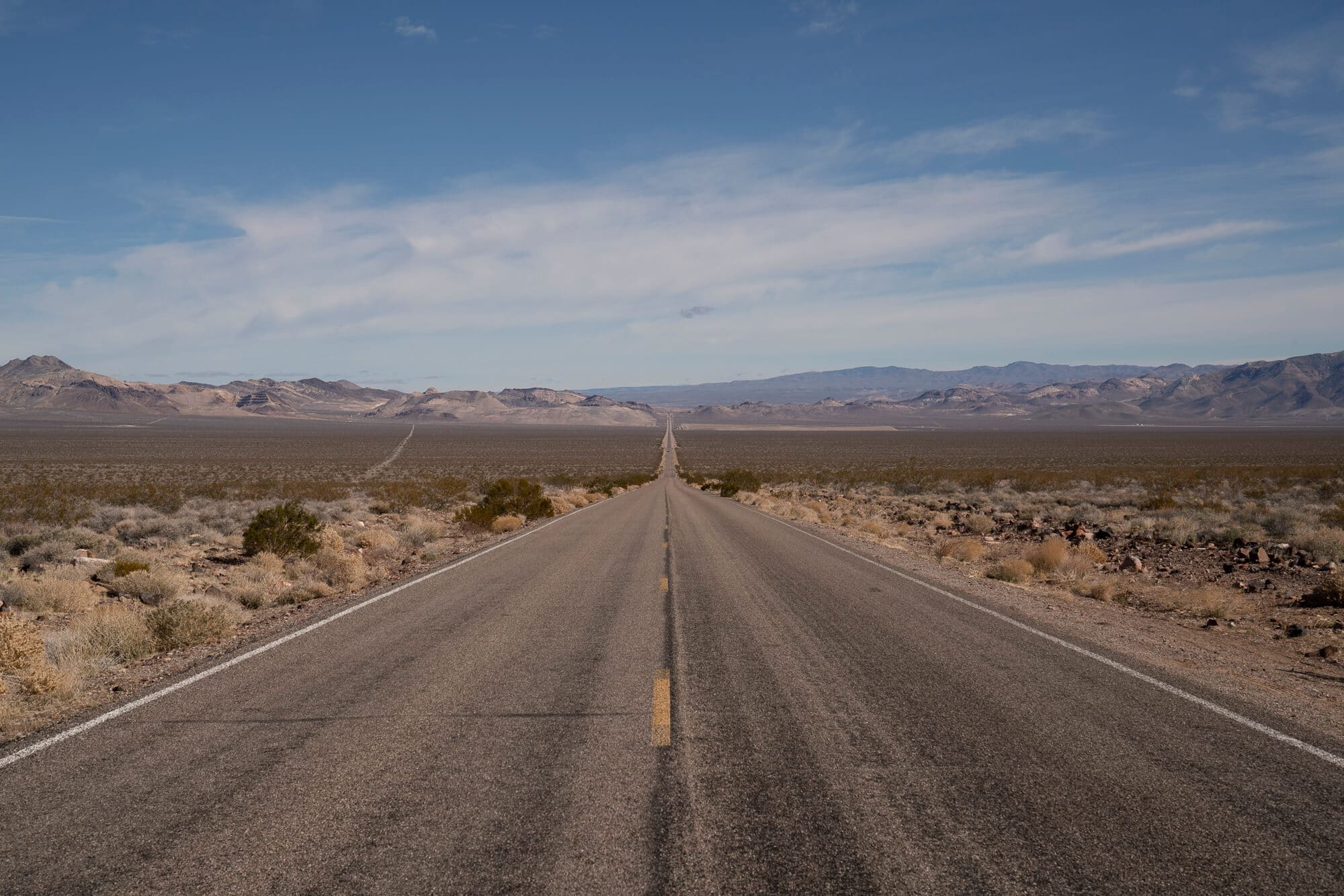 Long paved road going through Death Valley, California