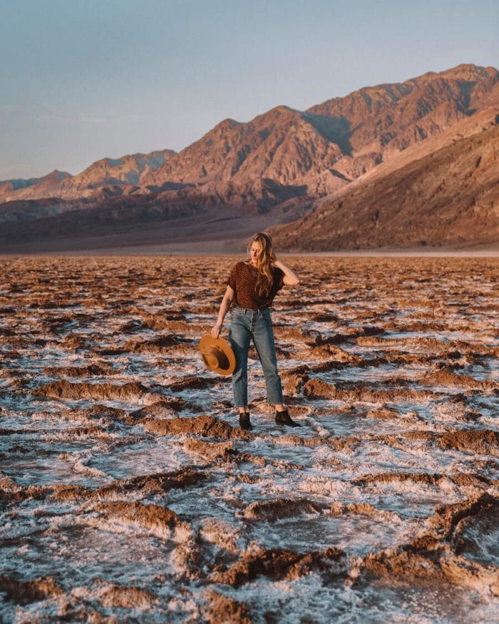 Girl standing in salt flats at Badwater Basin