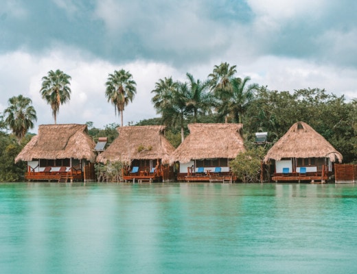 Overwater huts on the Bacalar Lagoon