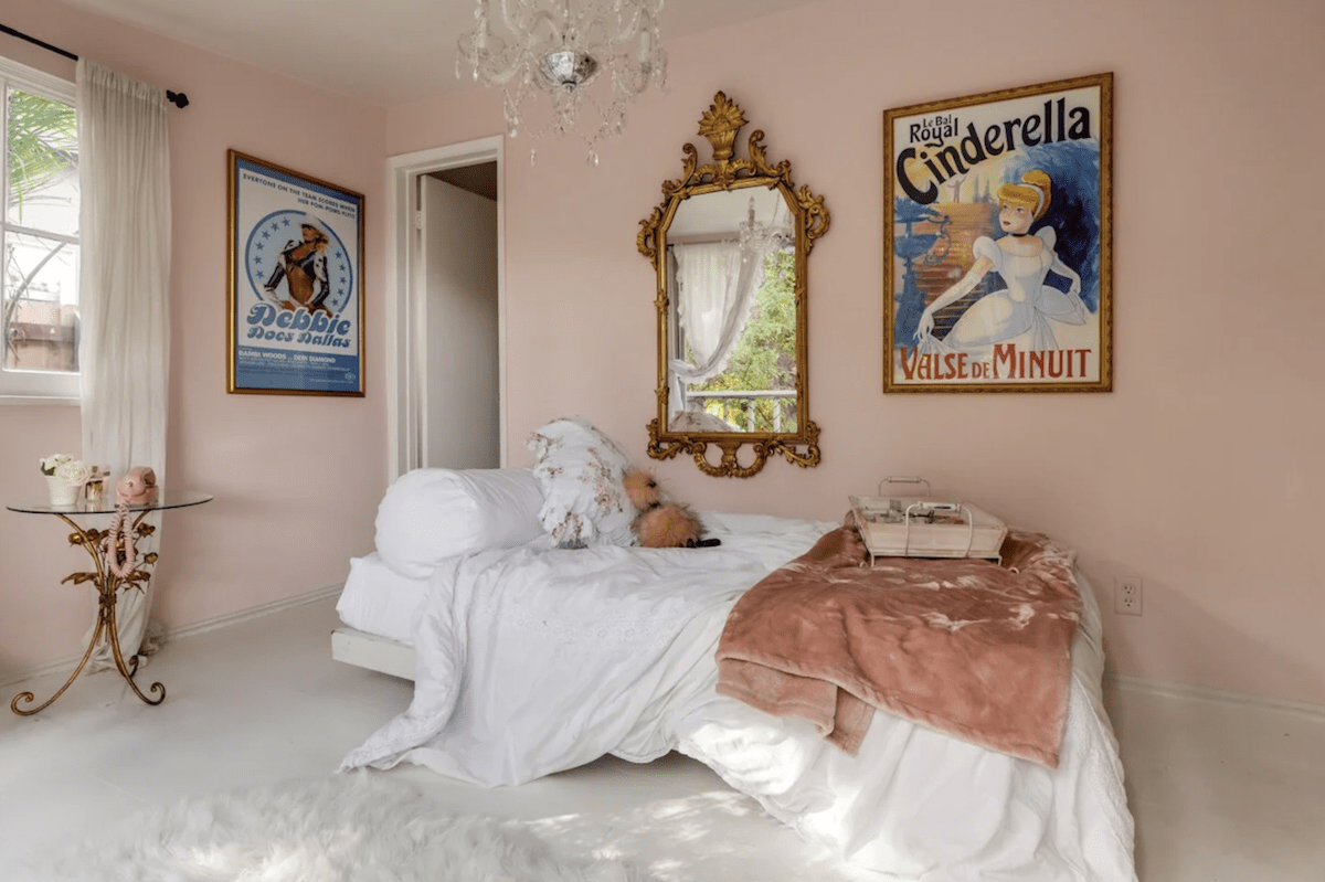 Pink and white interior of the Princess Charming cottage - unique places to stay in California