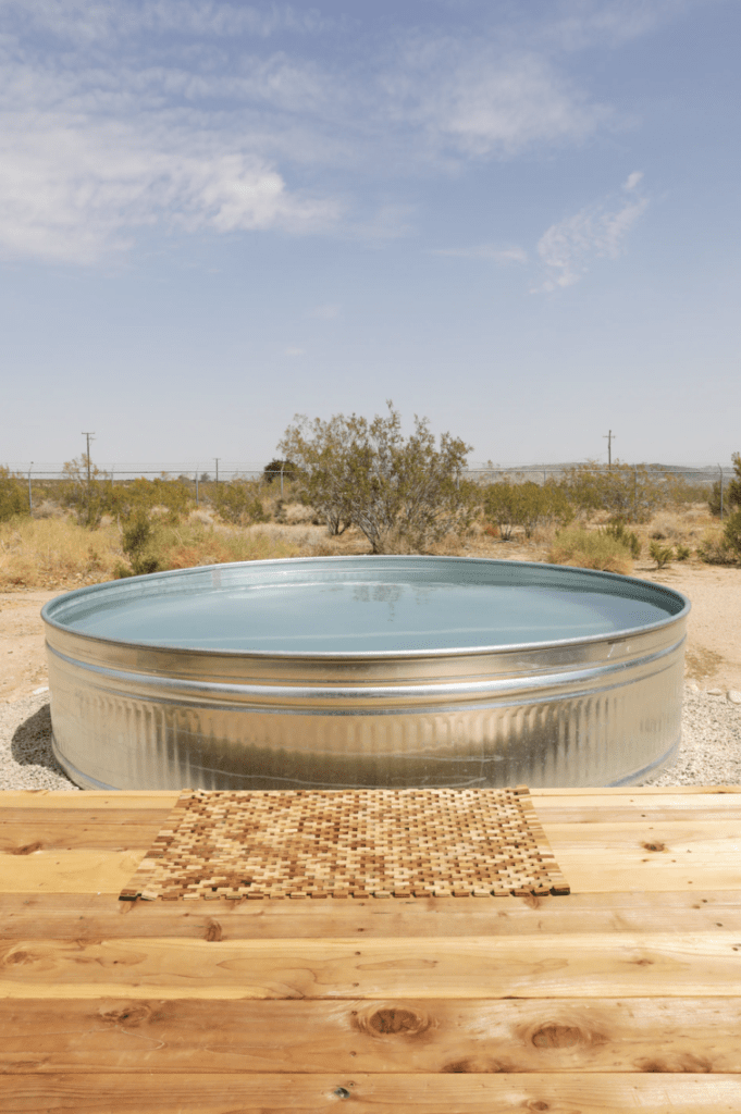 Outdoor metallic hot tub in the desert 