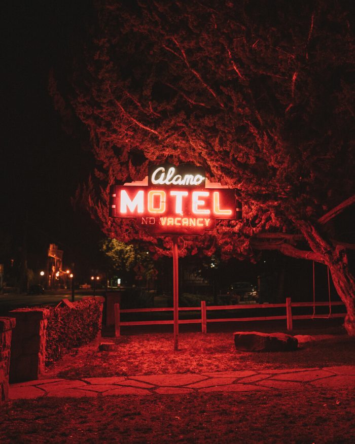 Alamo Motel sign at night