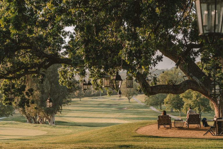 Golf course and lantern filled trees at the Ojai Valley Inn
