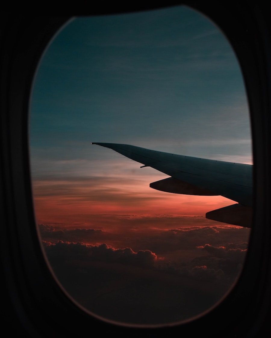 sunset looking out of plane window