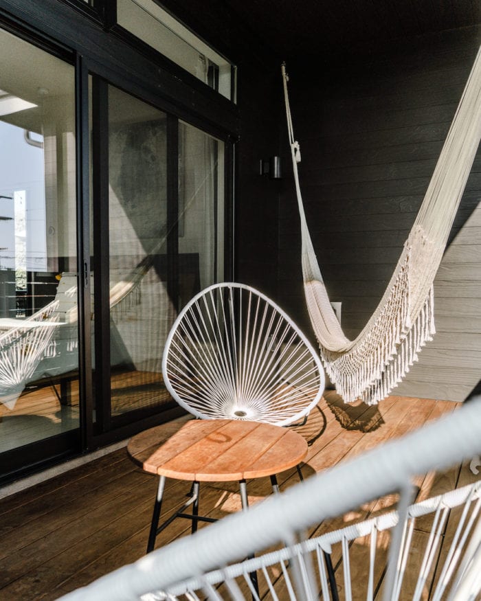 Room balcony with hammock at Twelve Senses