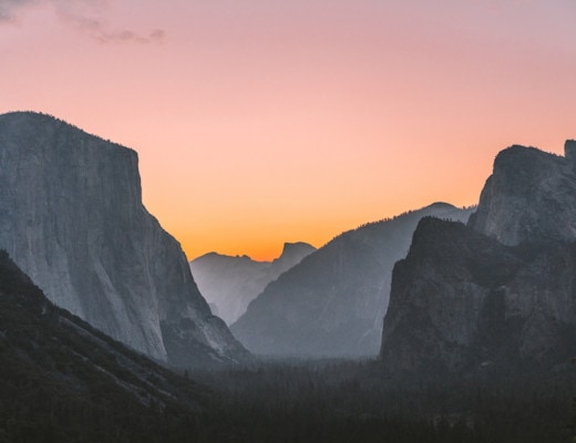 Sunrise light coming up over Tunnel View in Yosemite