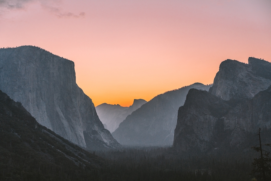 Sunrise light coming up over Tunnel View in Yosemite