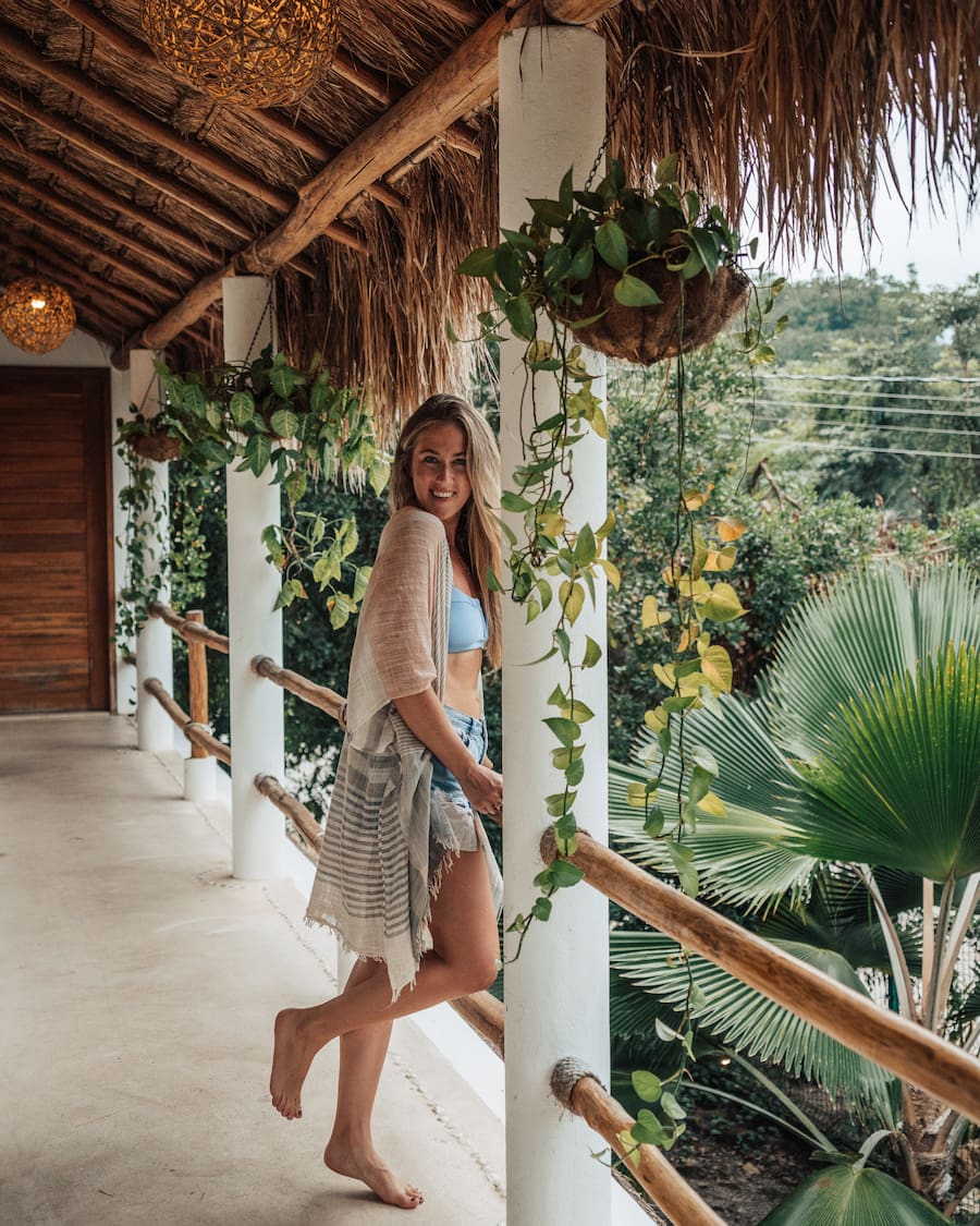 Michelle Halpern on balcony posing for Mexico travel tips blog