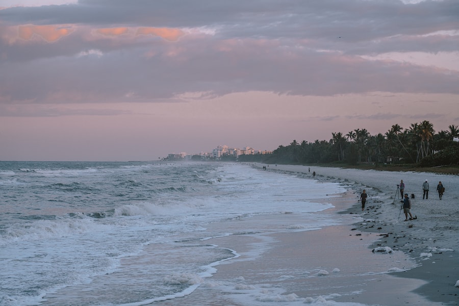 Naples Pier Beach with view of Naples city in the distance