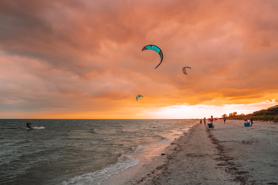 Sunset and wind surfers at Lighthouse Beach Park, Sanibel Island