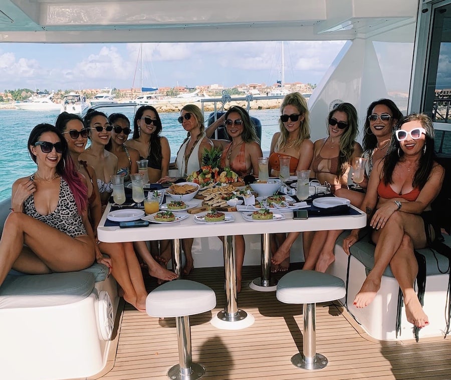 Group shot of girls on a luxury yacht on a trip to Tulum