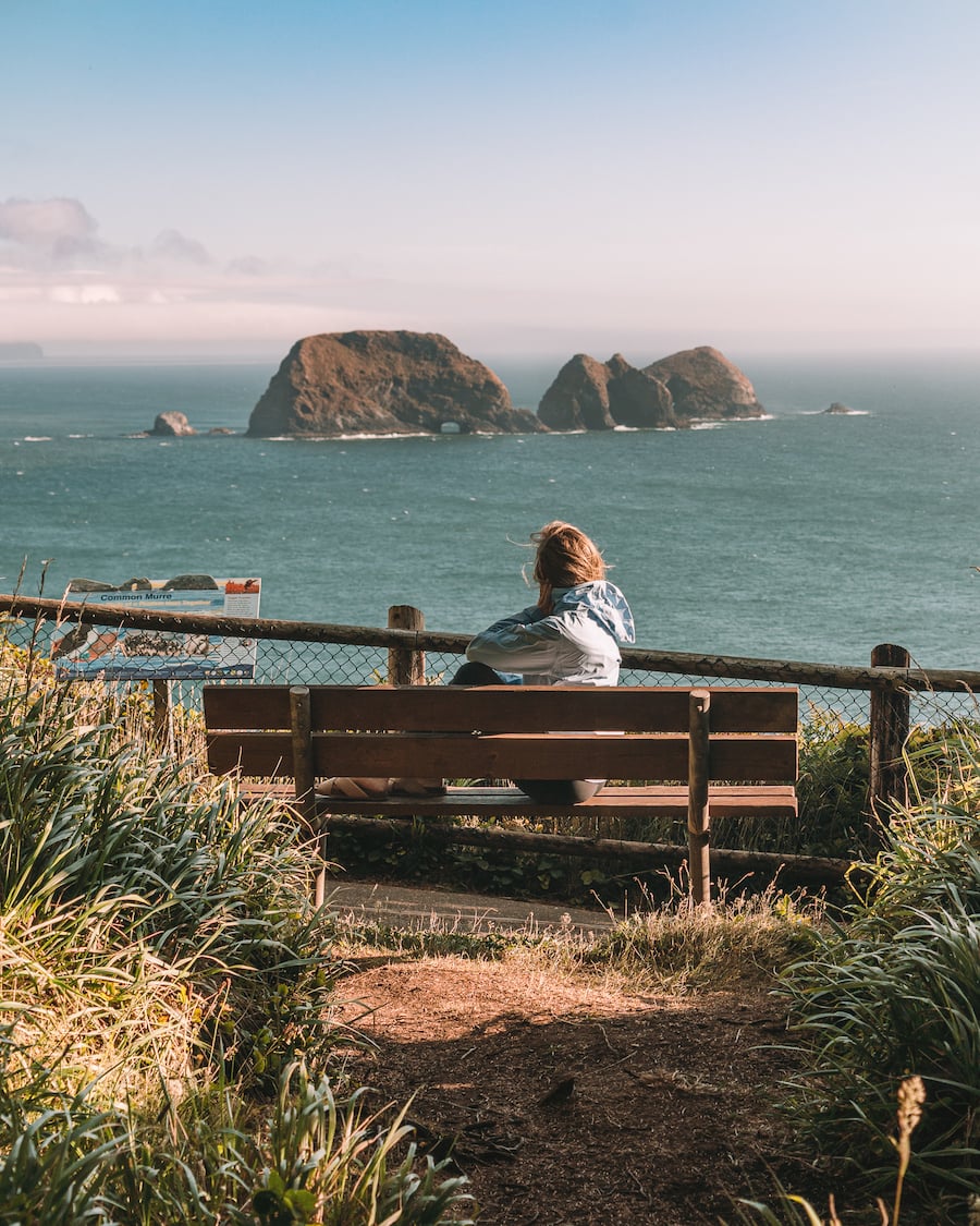 Michelle Halpern posing at Cape Meares for 10 Most Scenic Spots on the northern Oregon Coast blog