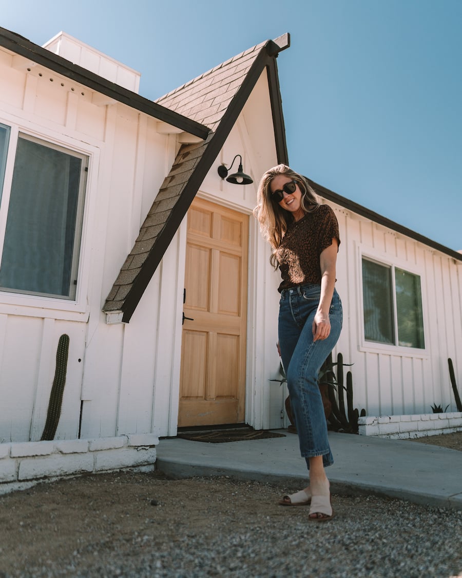 Michelle Halper posing outside of the Habibi House for things to do in Joshua Tree blog