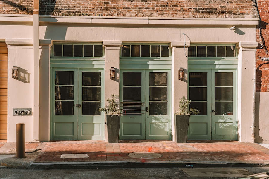 Green door entrance to Mint House New Orleans