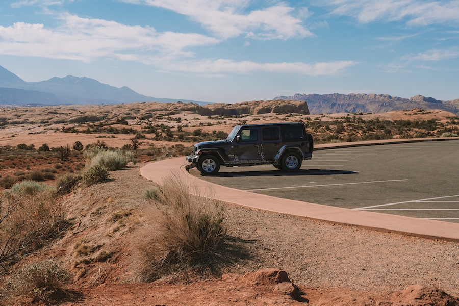 Jeep in the dessert for road trip essentials blog