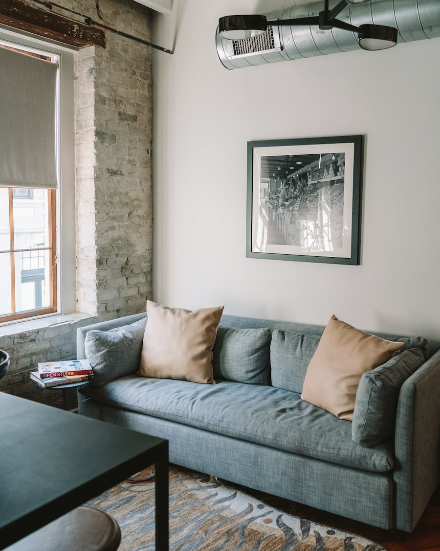 Couch and living area at Mint House New Orleans