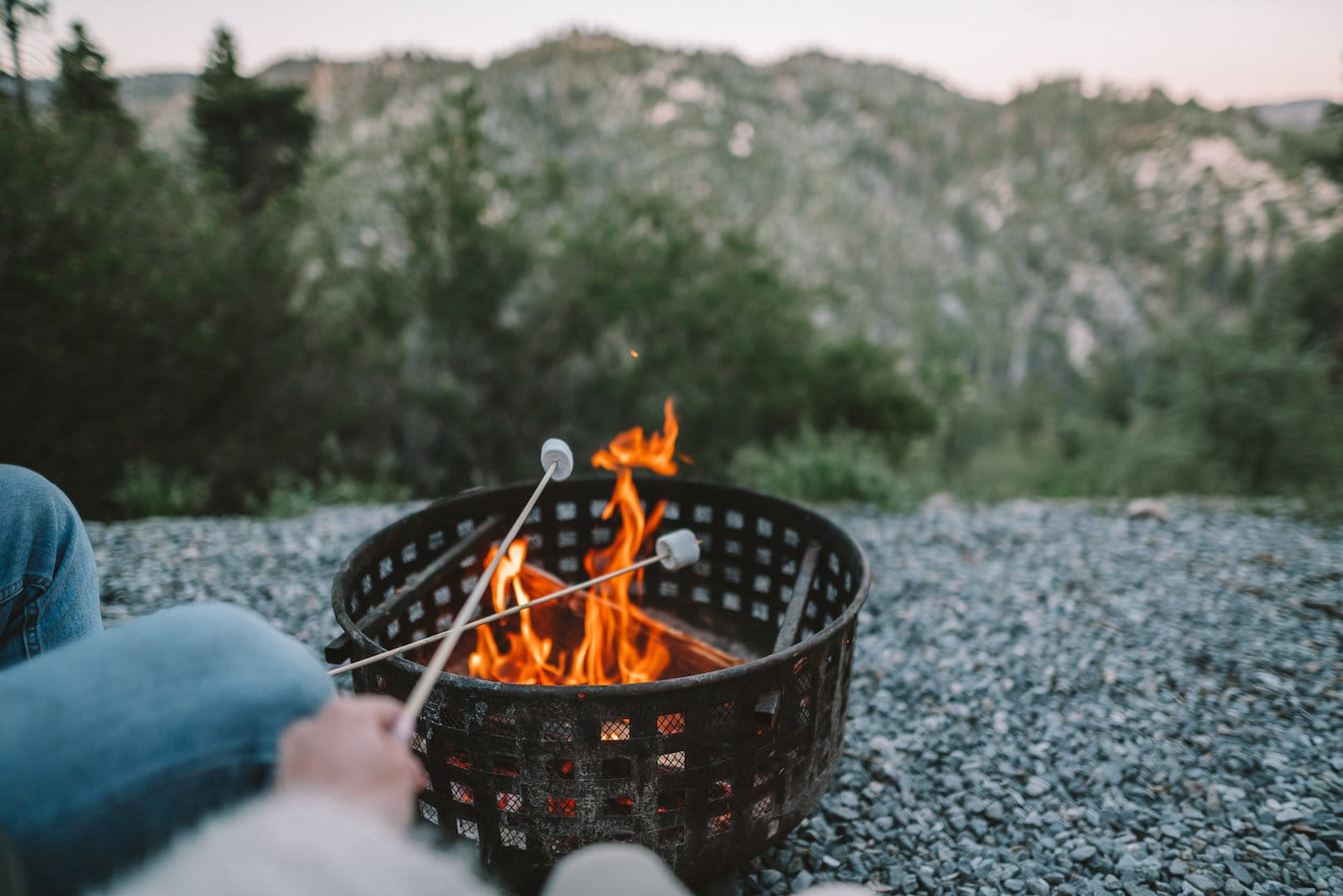 Roasting marshmallows by the fire at Getaway for a romantic getaway from Los Angeles