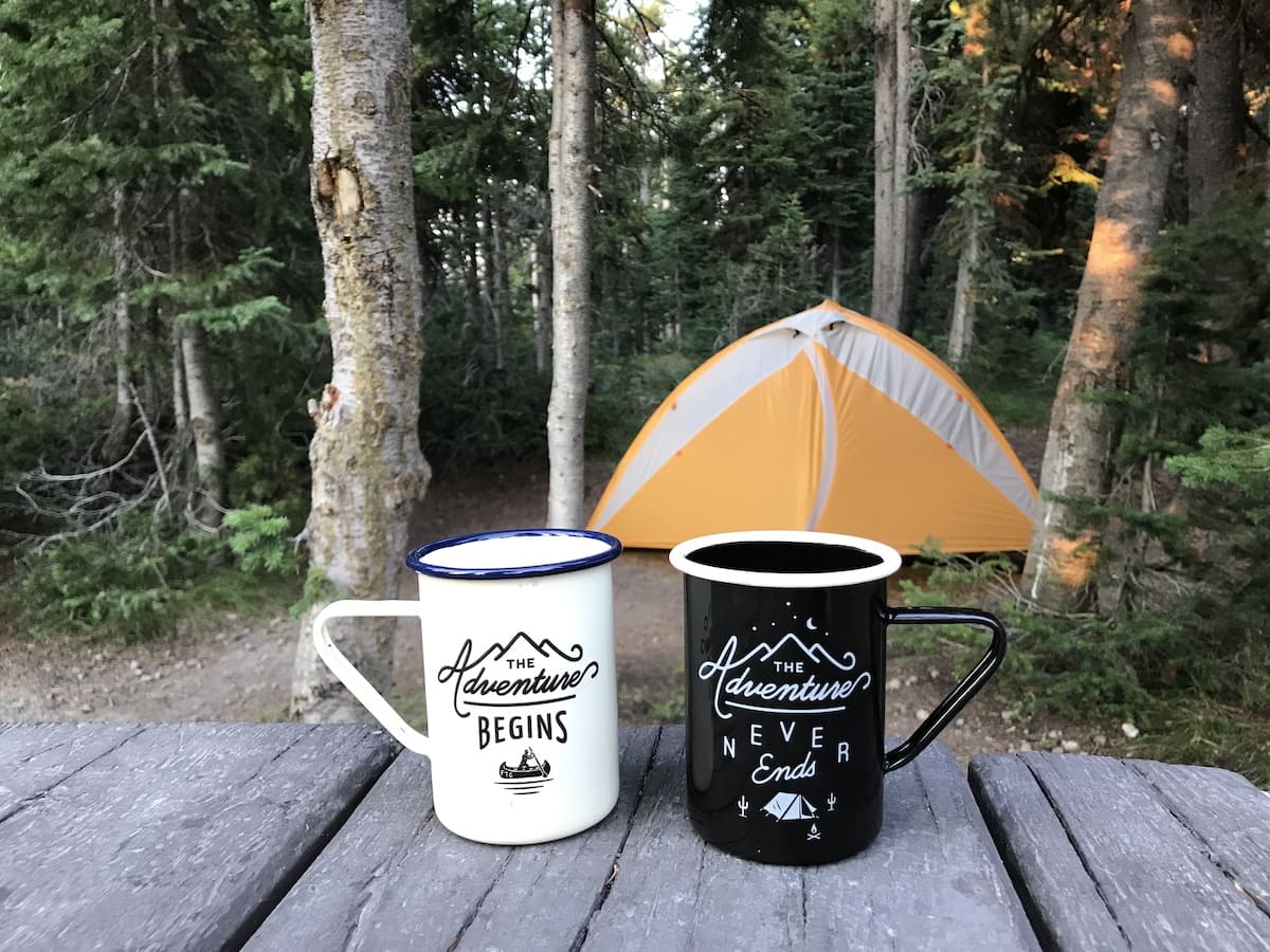 adventure mugs at campsite in front of tent in Yellowstone