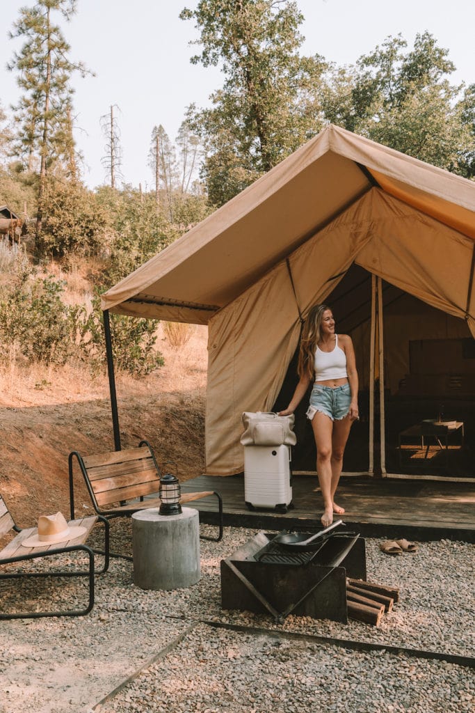 Michelle Halpern outside of the canvas glamping tent at AutoCamp Yosemite