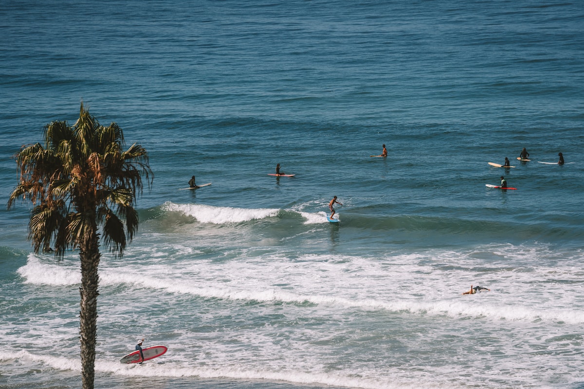 Surfers in California for fun things to do in California blog