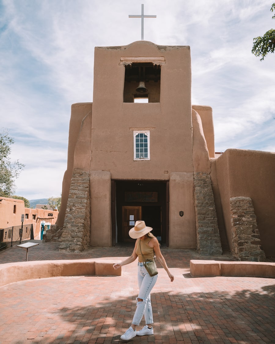 Michelle Halpern in front of San Miguel Chapel - things to do in Santa Fe