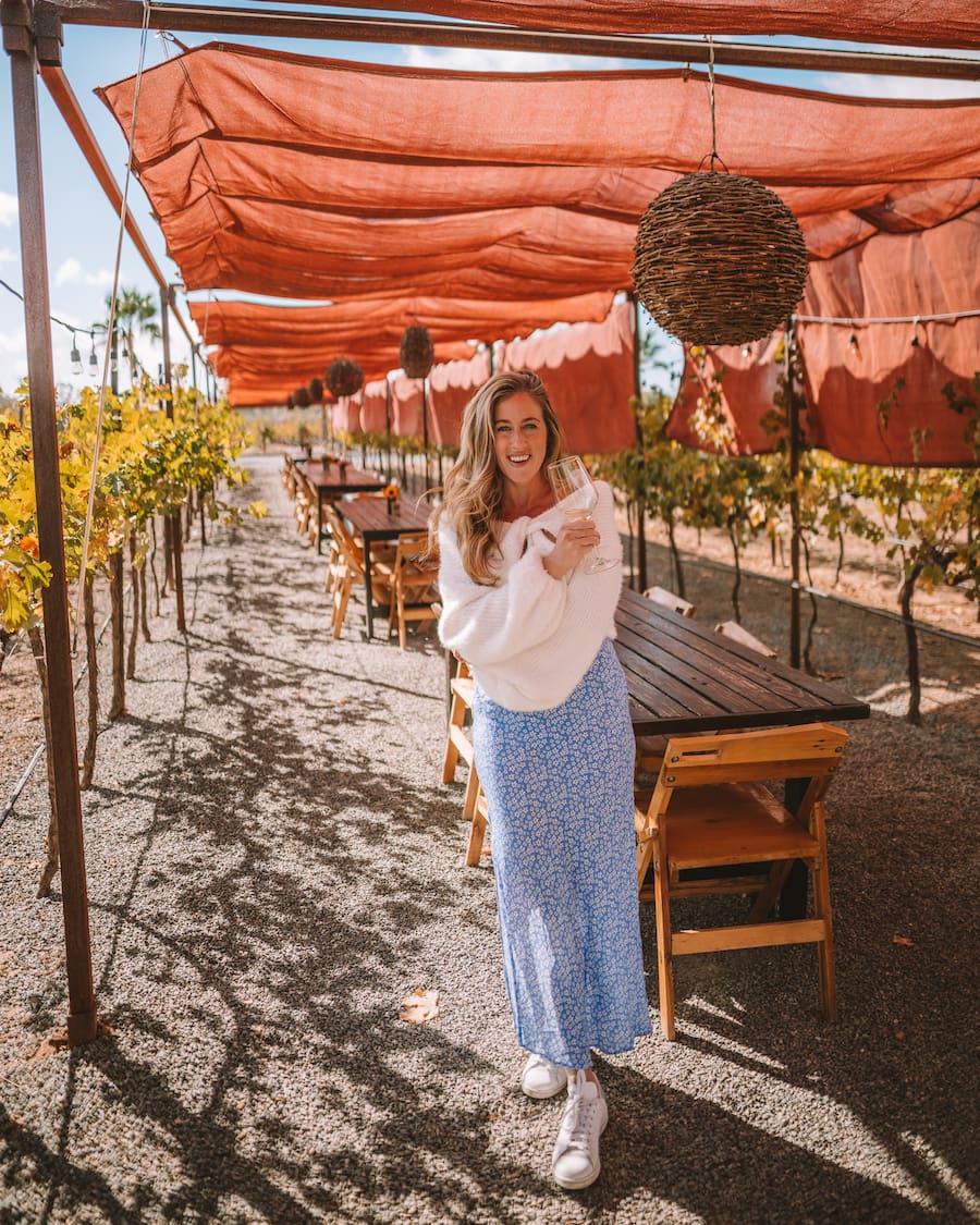 Michelle Halpern drinking wine at Vinos Lechuza in Valle de Guadalupe 
