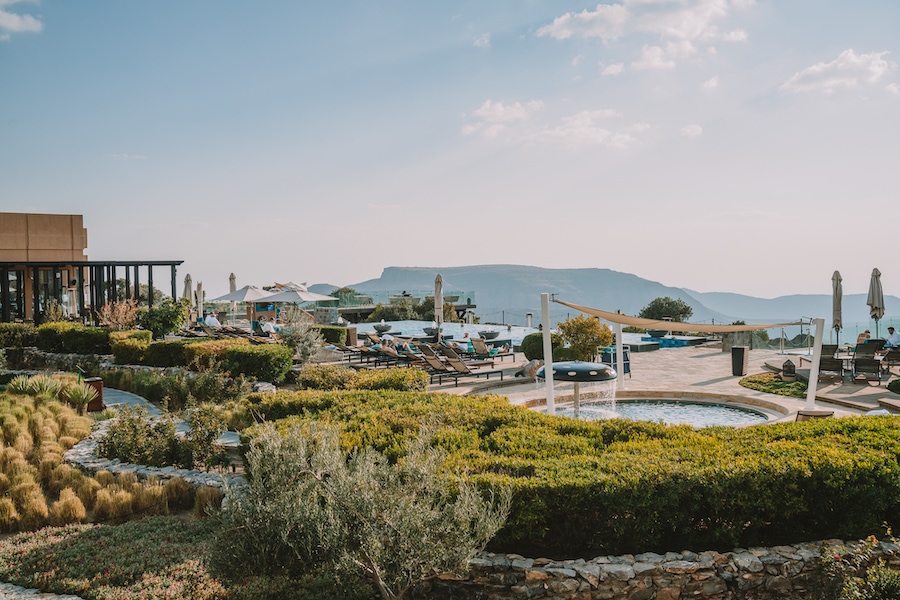 Pool deck view at Anantara hotel in the Jebel Akhdar mountains along your Oman road trip itinerary