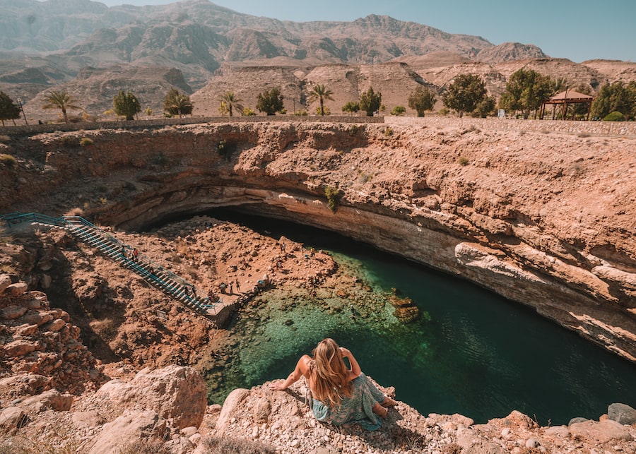 Overlooking the Bimmah Sinkhole in Oman with a view of the mountains in the background