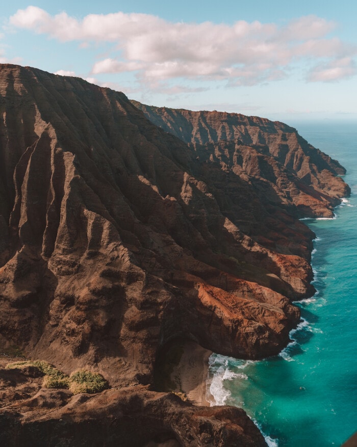 Kauai travel tips: make sure to visit the beautiful Na Pali Coast pictured here