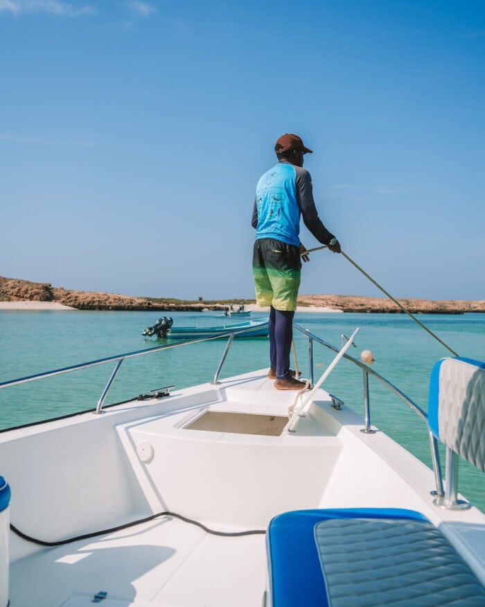 Captain Hussein from the Daymaniyat Islands snorkel tour dropping anchor