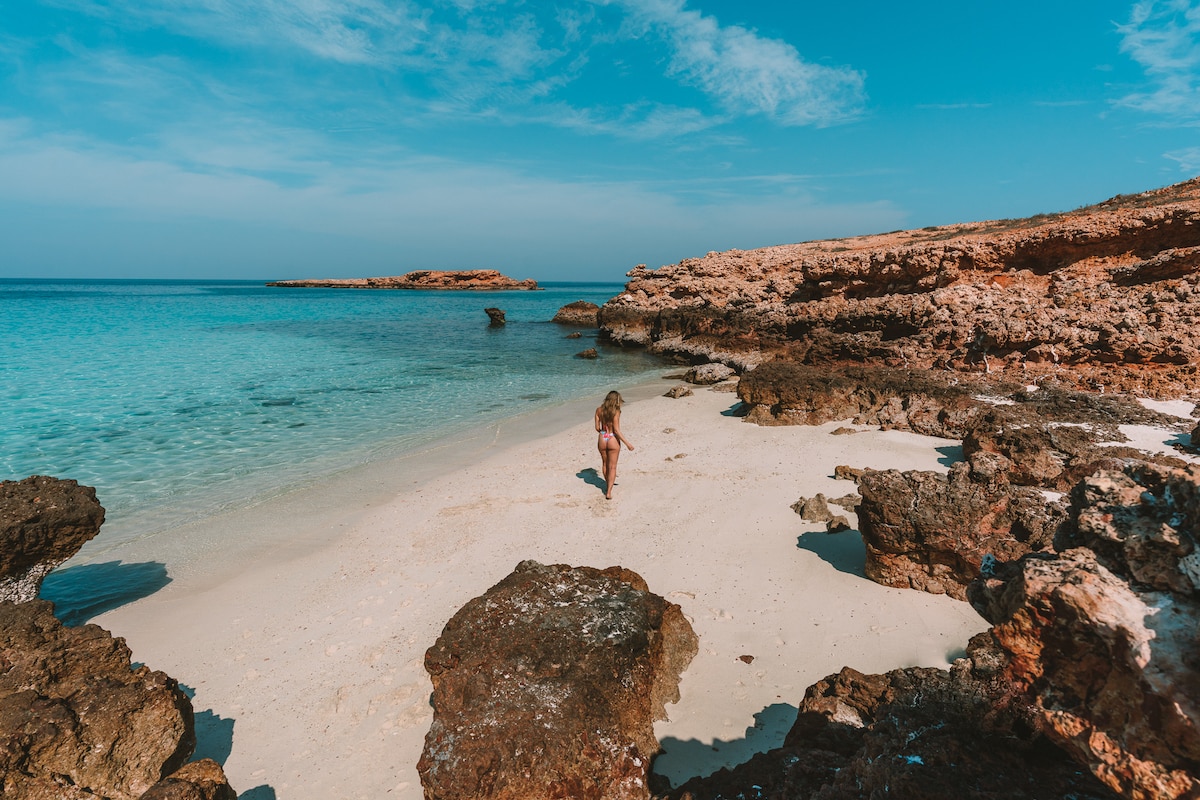 Michelle Halpern walking the beach in the Daymaniyat Islands in Oman