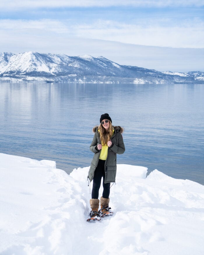 Michelle Halpern standing in front of Lake Tahoe in winter
