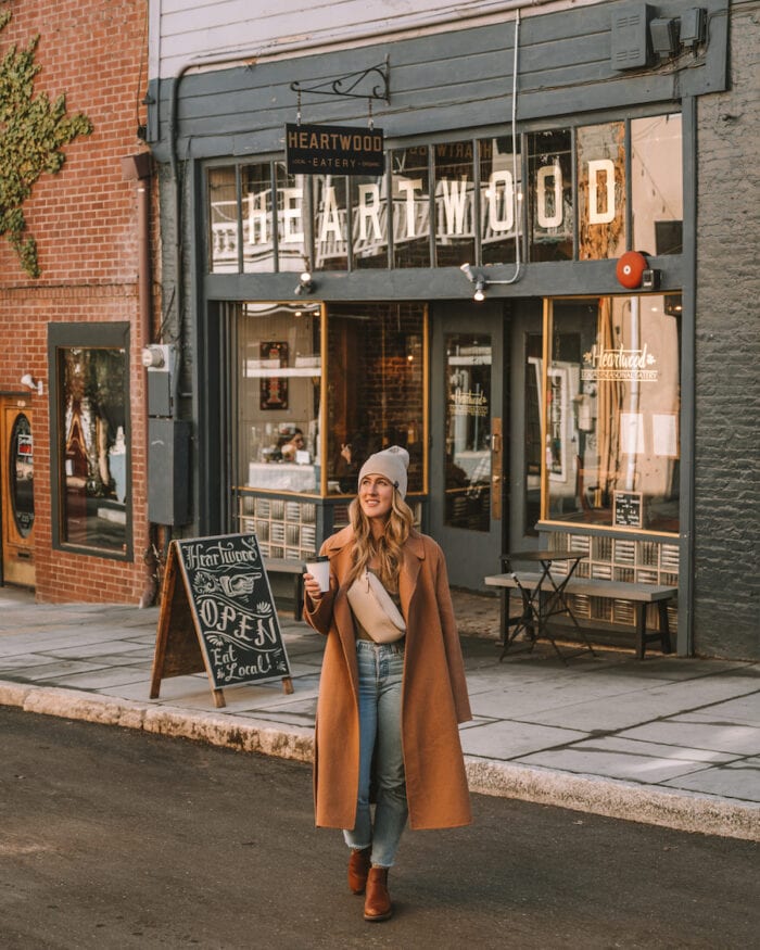 Michelle Halpern in front of Heartwood restaurant in winter clothes 