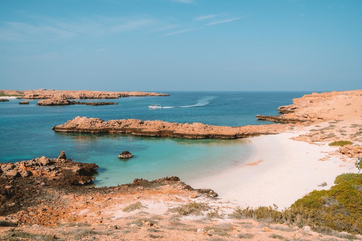 Landscape shot of white sands and turquoise beaches in the Daymaniyat Islands