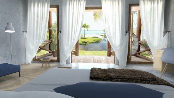 Room looking out to the lagoon with white draped curtains