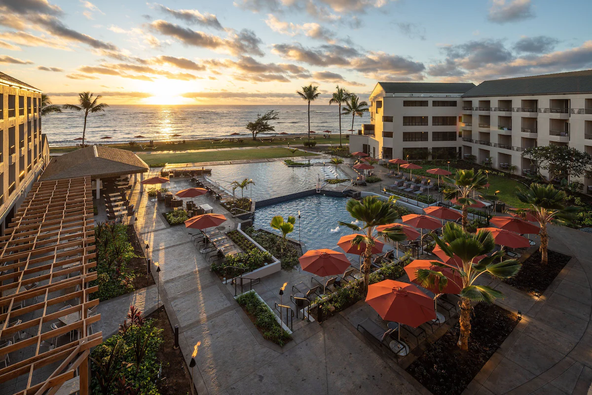 Aerial view of the Sheraton Coconut Beach overlooking the pool and red umbrellas