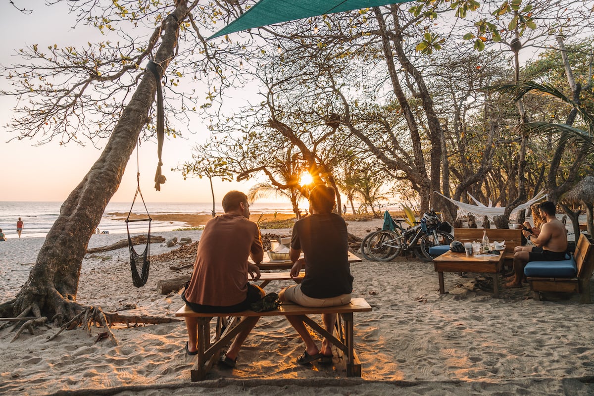 Guests enjoying the sunset from Rocamar