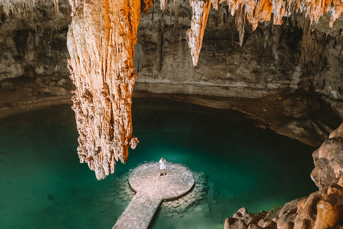 Anissa Borchradt standing in the center platform at cenote Suytun