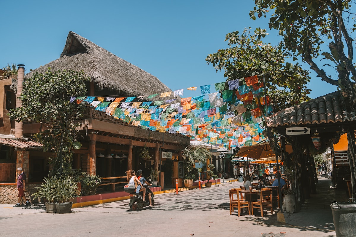 Colorful flag-lined street in San Pancho, Mexico