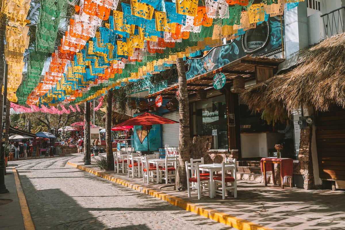 Colorful flags on Slap Street in Sayulita, Mexico