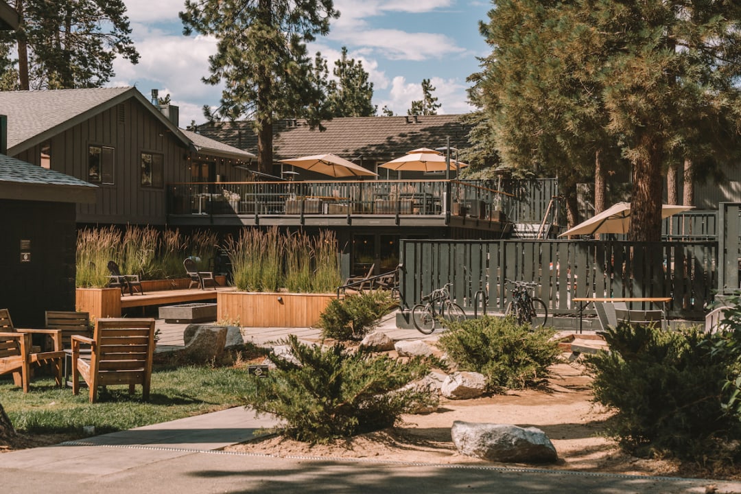 Outdoor area featuring fire pit and umbrellas at Coachman Hotel