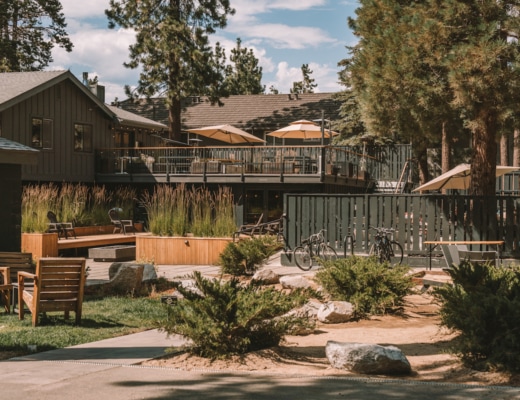 Outdoor area featuring fire pit and umbrellas at Coachman Hotel